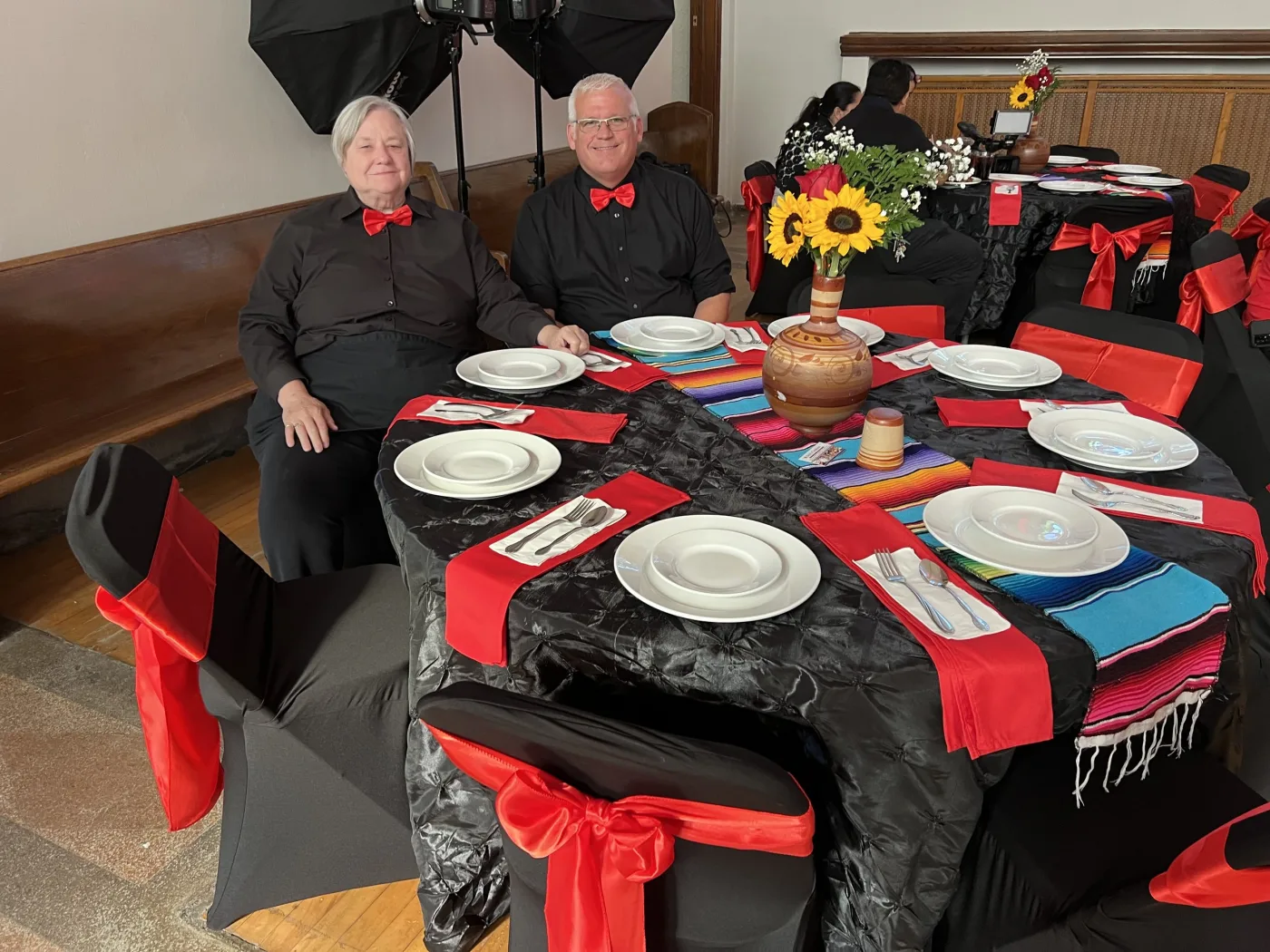 Dresden Castle staff beside a prepared event table
